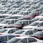 Top view of cars jam-packed in a parking lot