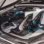 A look at the open driver's side door in a GAC Enverge at an auto show