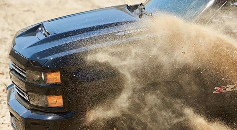 Black 2018 Chevy Silverado Kicking Up Dirt