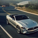Silver 2018 Ford Mustang on highway