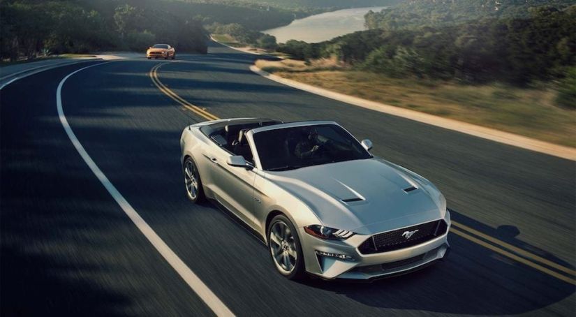 Silver 2018 Ford Mustang on highway