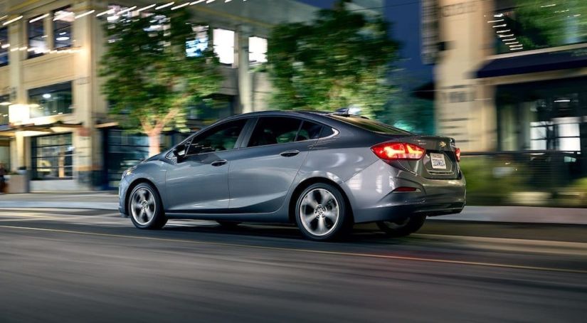 Gray 2019 Chevy Cruze driving on street