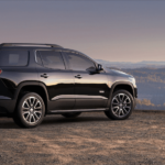Black 2019 GMC Acadia on mountain