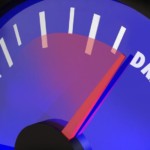 The words Autonomous Vehicles on an automobile gauge with the needle rising past Driver Assist to reach Self-Driving