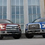 Used Ford Trucks. Red and blue 2015 Ford F-150s