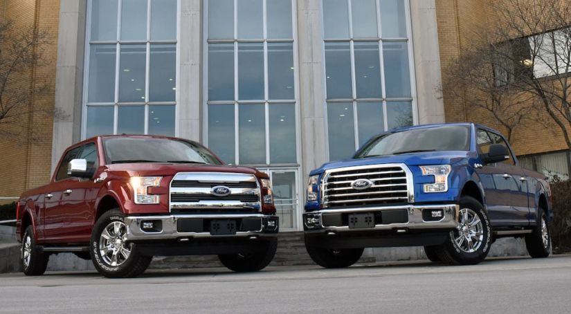 Used Ford Trucks. Red and blue 2015 Ford F-150s