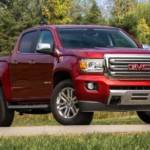 Red 2019 GMC Canyon in woods