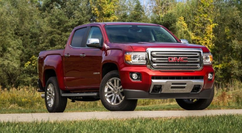 Red 2019 GMC Canyon in woods