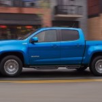 Blue 2019 Chevy Colorado on city street