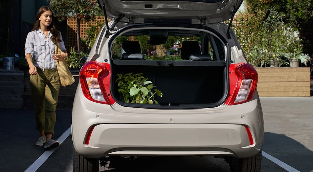 Beige 2019 Chevy Spark with rear hatch open