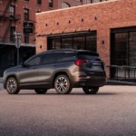A black 2019 GMC Terrain stands victorious in 2019 GMC Terrain vs 2019 Ford Escape in a city