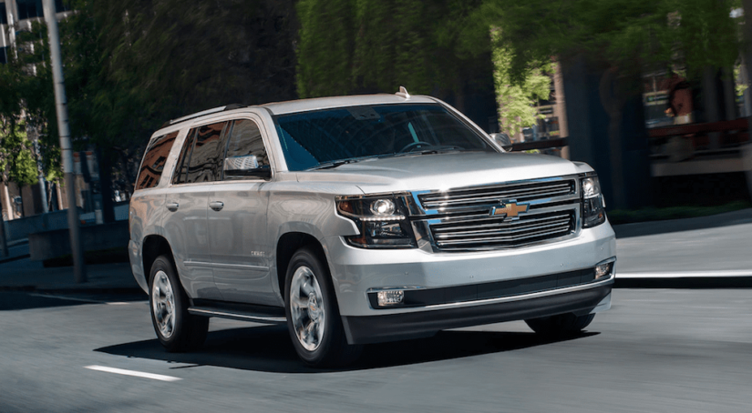 A silver 2019 Chevy Tahoe drives away victorious in the 2019 Chevy Tahoe vs 2019 Dodge Durango