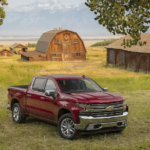 A red 2019 Chevy Silverado in a shootout wioth the 2019 GMC Sierra 1500 vs 2019 Chevy Silverado