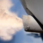 A closeup of smoke leaving a car exhaust