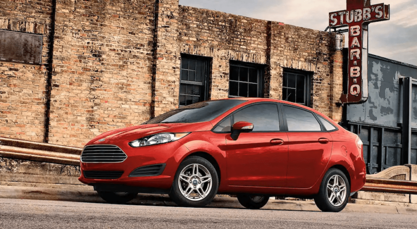 A red 2019 Ford Fiesta on a test derive from a local Ford Dealership