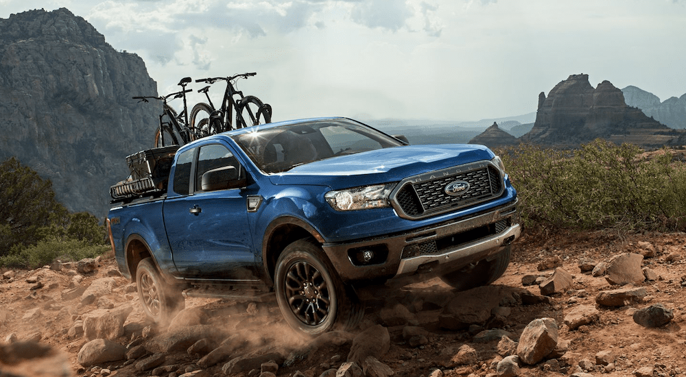 A blue 2019 Ford Ranger tears up a dirt trail