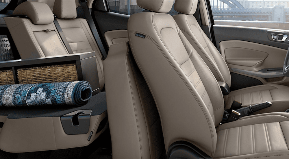 The image is showing the Ecosport's cargo space and tan interior to compare the 2019 Ford EcoSport to the 2019 Mazda CX-3