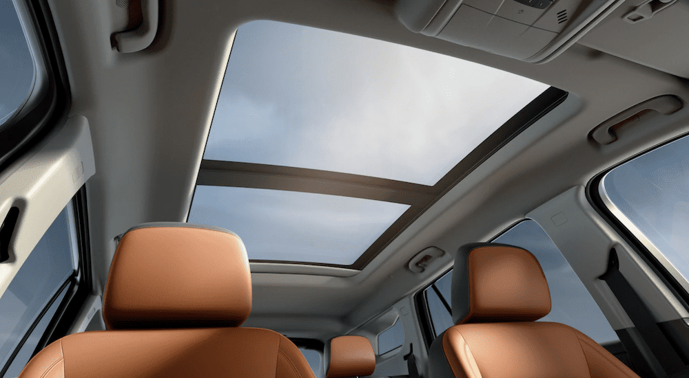 The interior of this 2019 GMC Terrain features tan and cream coloring and a sunroof. It wins in comparison of the 2019 GMC Terrain vs. 2019 Toyota RAV4.