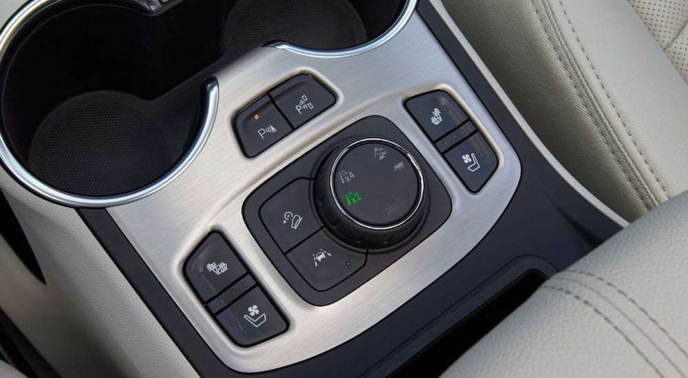 A closeup of the traction controls on a 2019 GMC Terrain