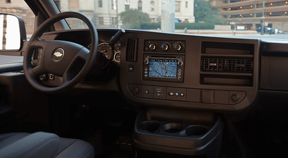 The interior of the 2019 Chevy Express Cutaway is shown with its Infotainment 3 System.