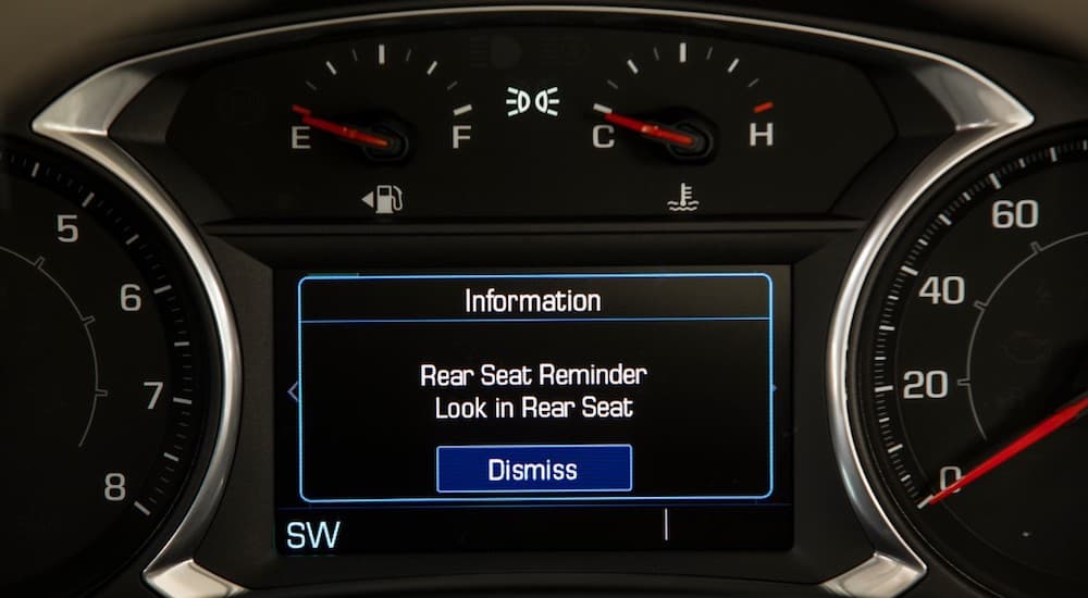 A closeup of the rear seat reminder in a Terrain Denali, a safety feature that helped it win 2019 GMC Terrain vs 2019 Ford Escape
