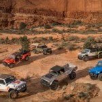 The lineup of concept Jeeps at the 2019 Moab Utah Easter Jeep Safari in current auto news is shown in front of the red rocks.