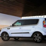 A white 2010 Kia Soul is in a warehouse. The older models can be found at a used Kia dealership.