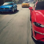 Three 2019 Ford Mustangs, popular among Ford cars for sale, are driving towards the camera view.