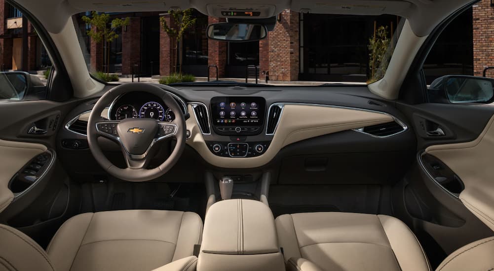 The tan interior of a 2019 Chevy Malibu is shown.