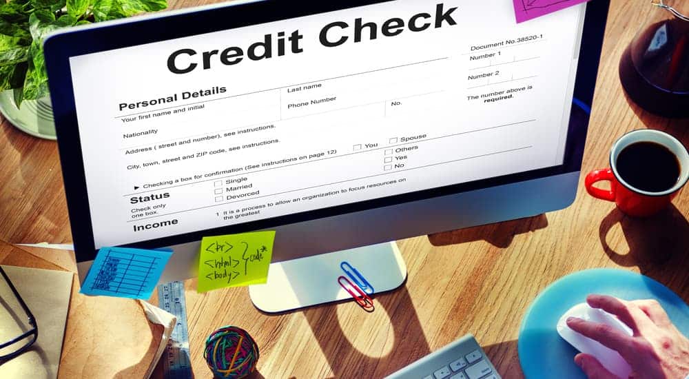 A credit check form is shown on a computer screen.