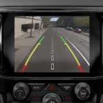 The touchscreen inside a 2019 Jeep Grand Cherokee is displaying the back-up camera.