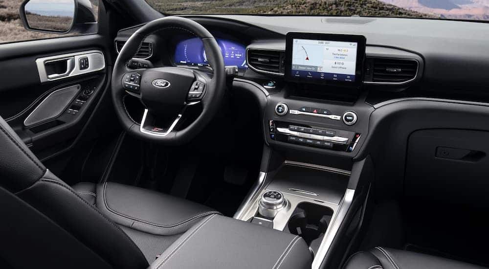 The front black leather interior of the 2020 Ford Explorer. 