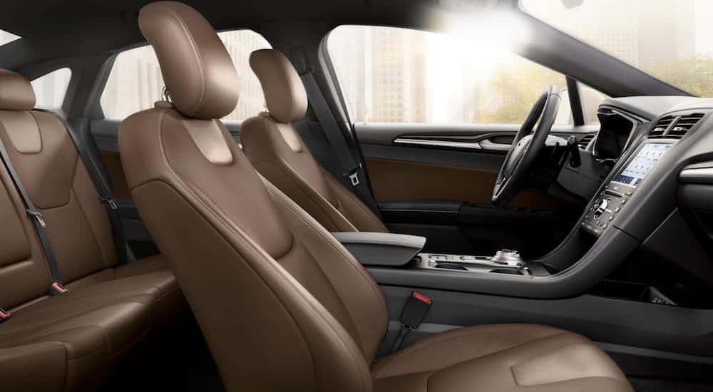 The brown leather interior that can be found in a 2020 Ford Fusion is shown. 
