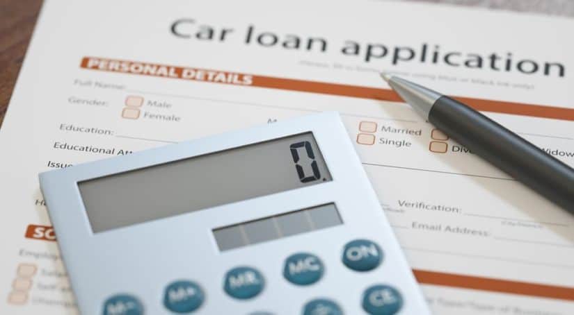 A car loan application with a calculator is shown.