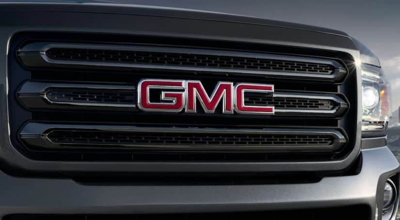 A close up of a 2020 GMC Canyon's grille is shown,.