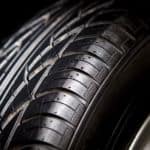 A close up of a car tire is shown.