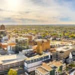 An aerial of Allentown, PA, where you'll find some of the best Pennsylvania auto dealers in the state, is shown on a sunny day.