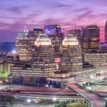 The sunset is shown over Cincinnati, OH.