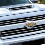 A close up of a white 2017 Chevy Silverado 1500 is shown.