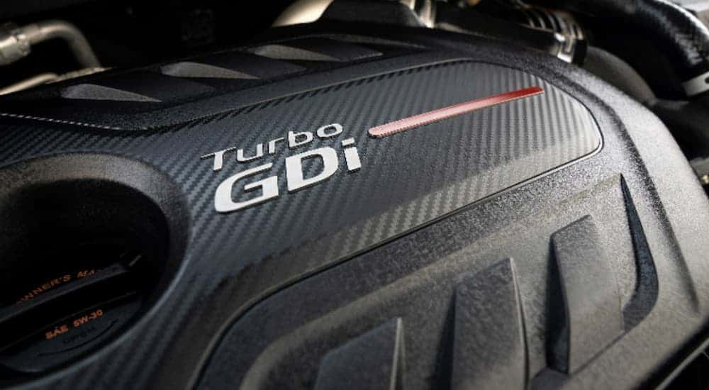 A closeup of the 2020 Kia Sportage's turbo GDi motor is shown.