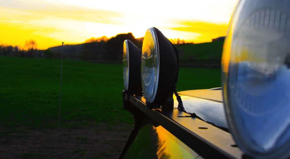 A closeup is shown of a light bar on a vehicle at sunset. You can find a similar one at your local Jeep Dealership.