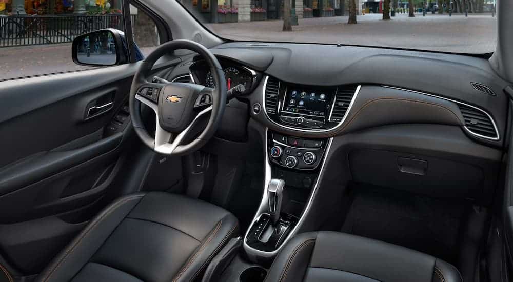 The black interior of a 2020 Chevy Trax is shown.