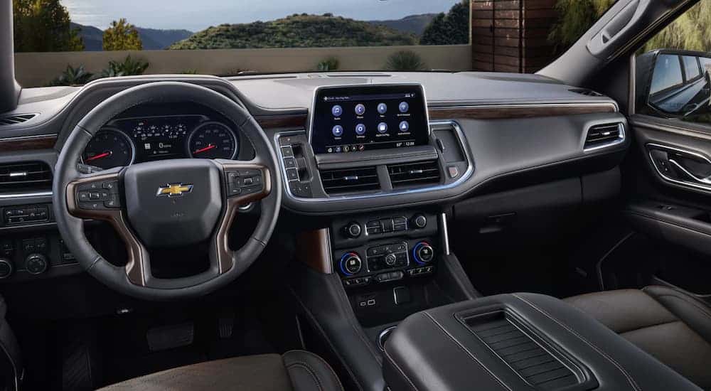The black interior of a 2021 Chevy Suburban is shown.