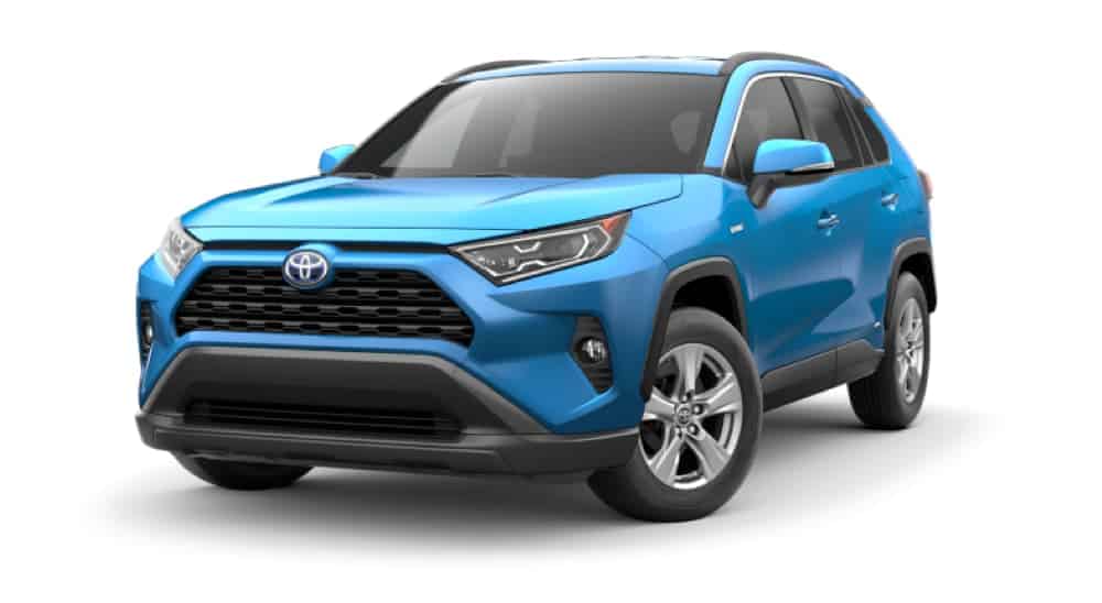 A blue 2020 Toyota RAV4 Hybrid XLE is one a white background angled left.