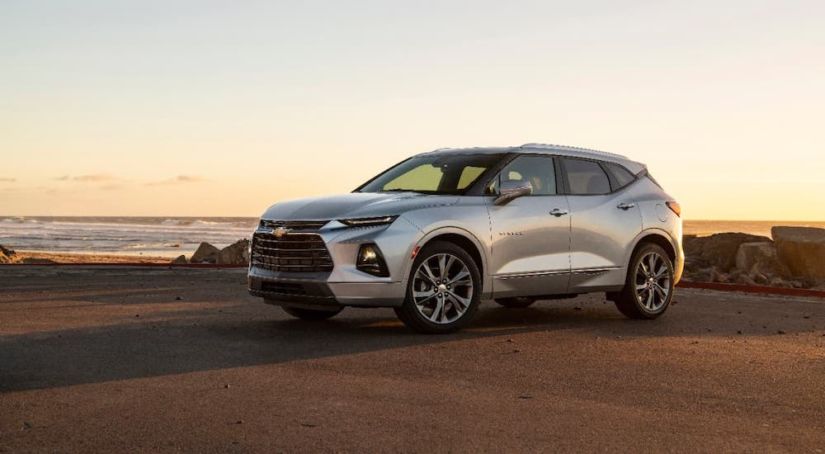 A silver 2020 Chevy Blazer is parked at a beach after winning the 2020 Chevy Blazer vs 2020 Chevy Equinox comparison.