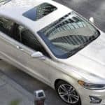 A white 2020 Ford Fusion is shown from above after winning the 2020 Ford Fusion vs 2020 Chevy Malibu comparison.