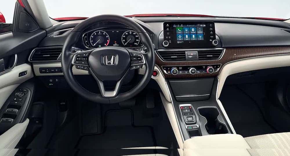 The black and white interior of a 2020 Honda Accord Touring 2.0T is shown.