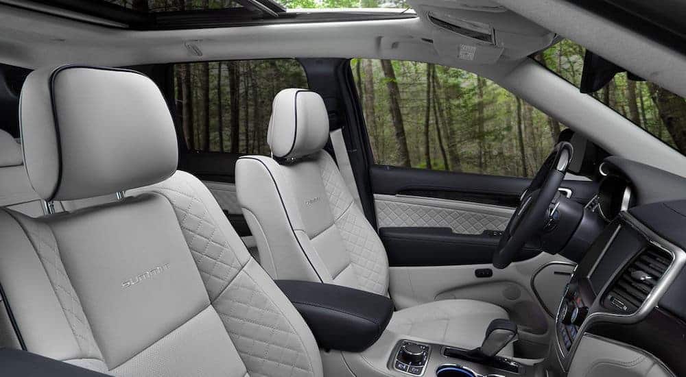 The grey interior is shown on the 2020 Jeep Grand Cherokee Summt.