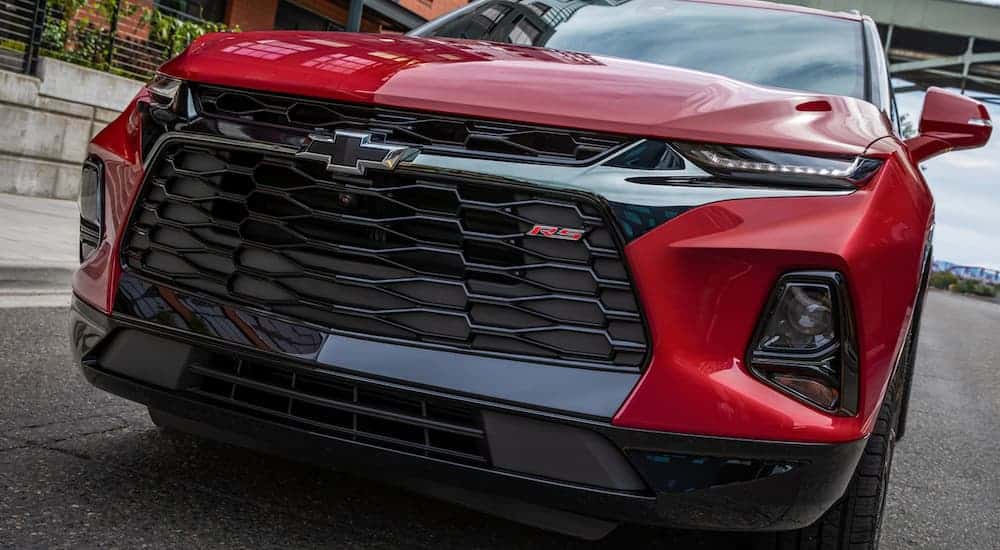 The front of a red 2021 Chevy Blazer RS is shown in closeup.