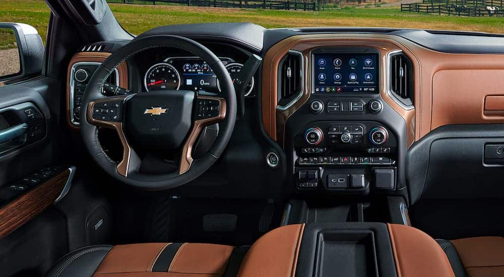 The black and brown interior is shown on the 2021 Chevy Silverado 1500.